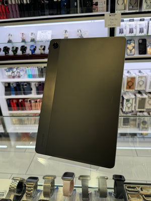 Black electronic device on display with a blurred background of similar products