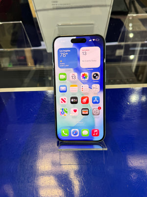 Smartphone on a stand with app icons displayed against a blue background